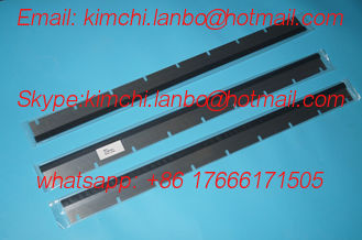China SM74 wash up blade,SM74 machine Rubber washup blade,good quality,9 slots, 822*57*0.5mm supplier